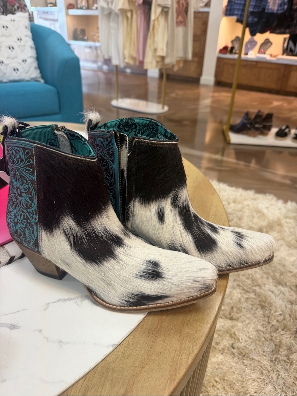 Myra Bag Black & White Cowhide Ankle Booties with Teal Accents